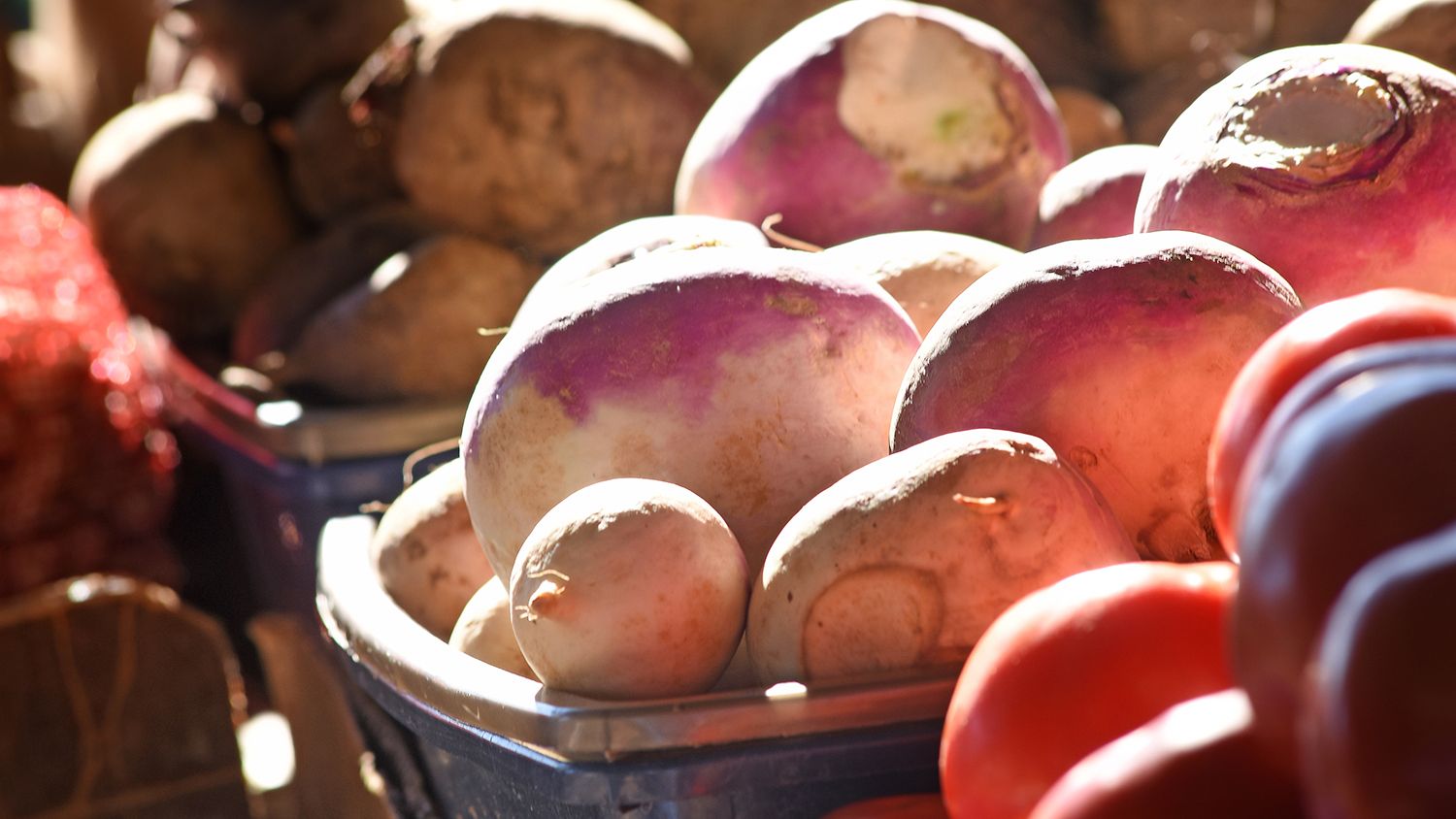 box of fruits and vegetables at a farmers market