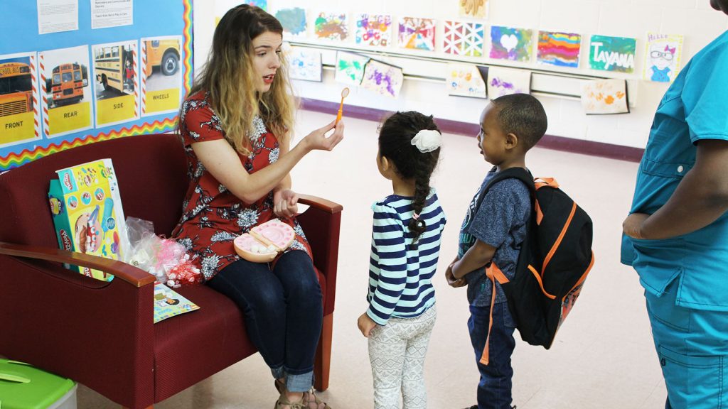 NC State student teaching preschoolers about dental health