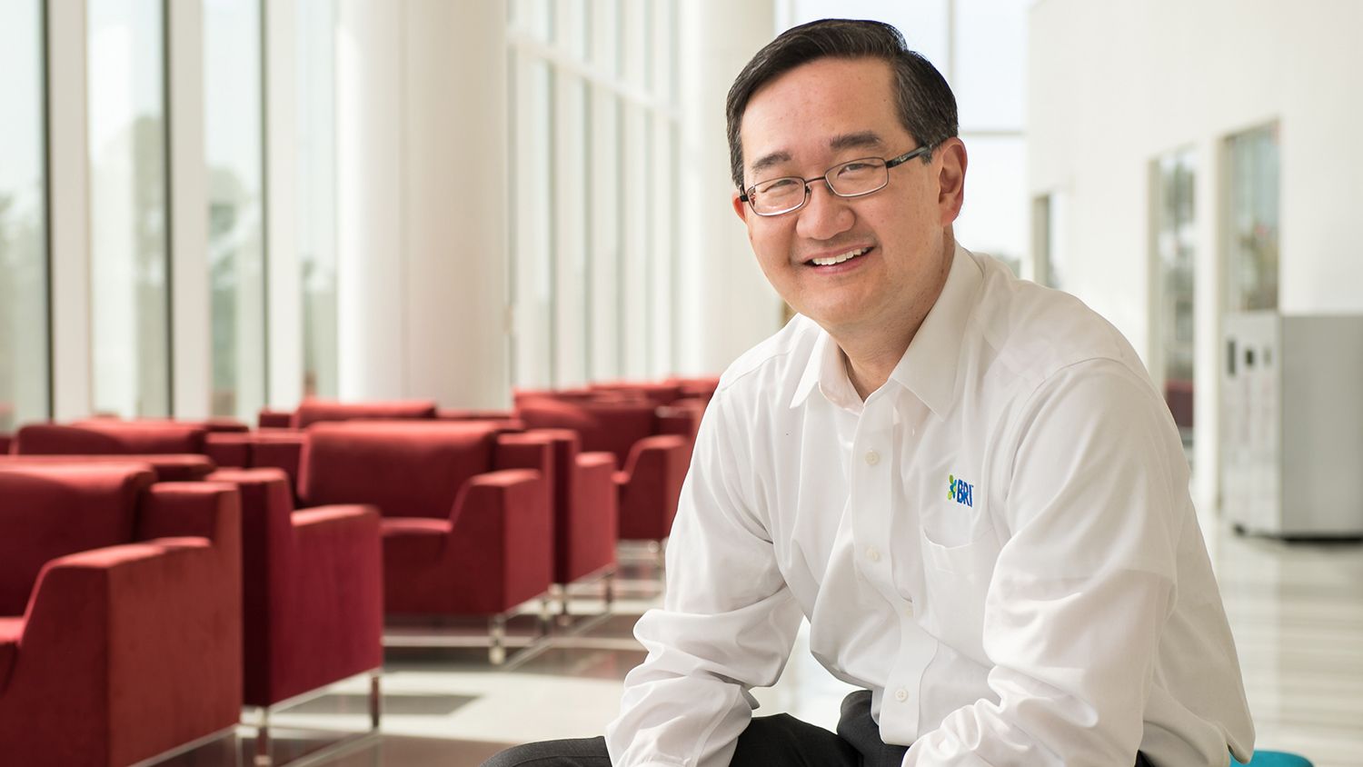 Business executive seated in a lobby