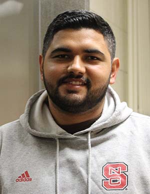 Head shot of Juan Ascencio outside NC State's meat lab
