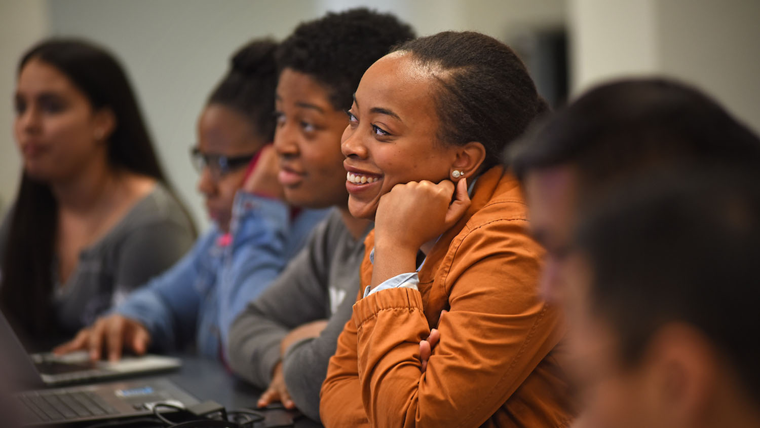 Student listens to a classmate's presentation in Dr. Paul Mozdziak's Scott Hall lab.