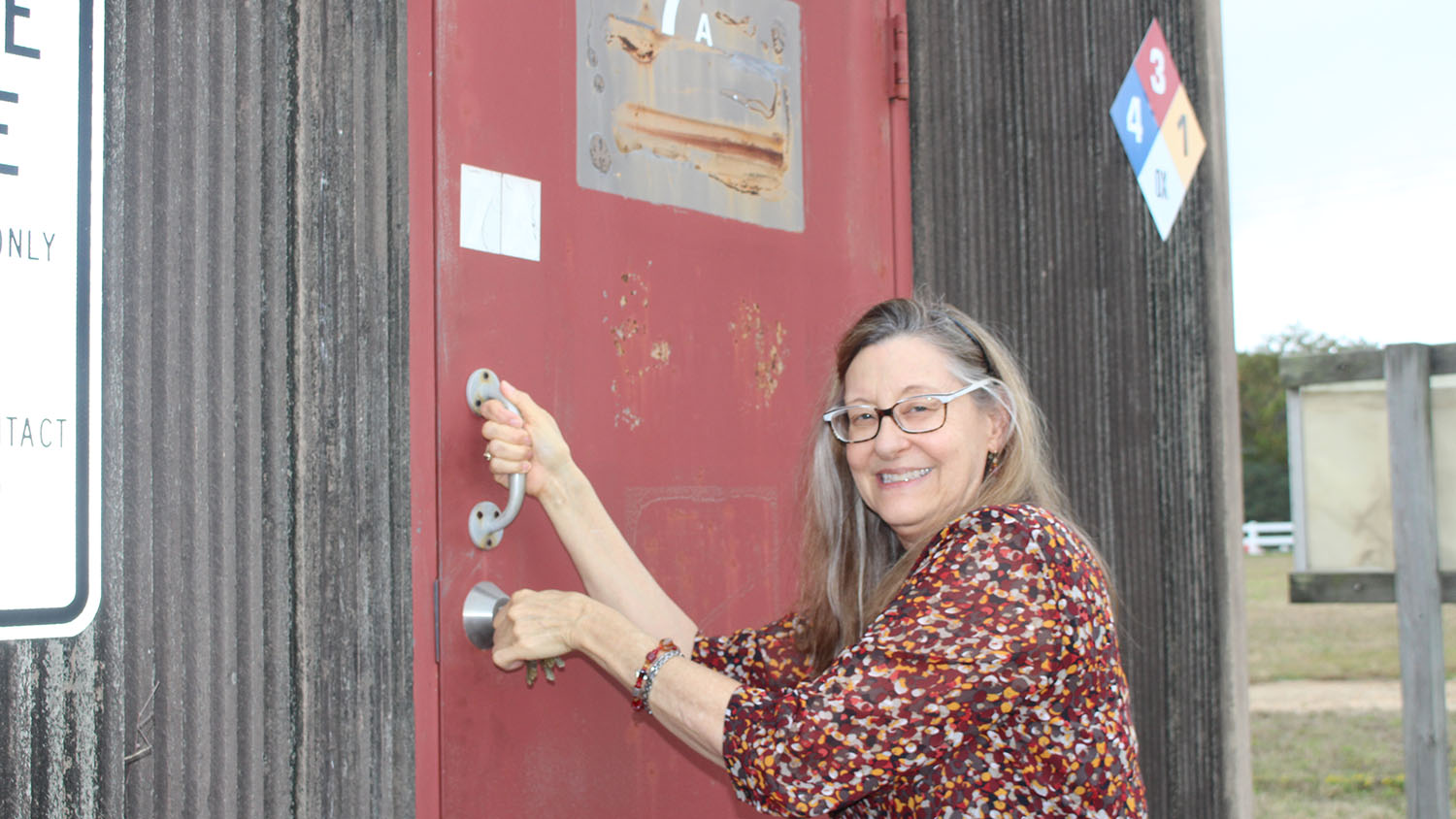 Candy Orr at the pesticide storage complex.