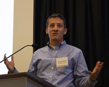 Rob Scheller talking at a symposium.