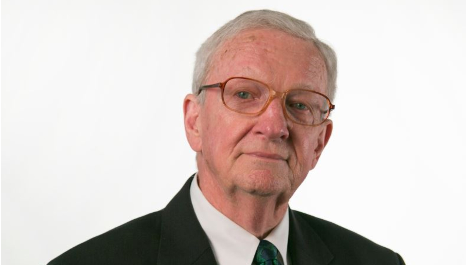 Head and shoulders shot of man against a white background