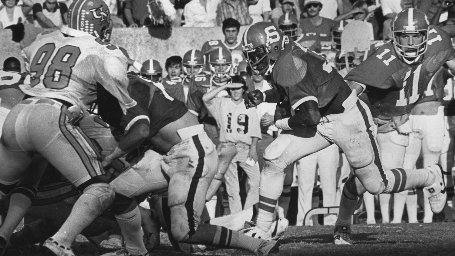 Billy Ray Vickers carries the ball down field in a Technician photo, circa 1979.