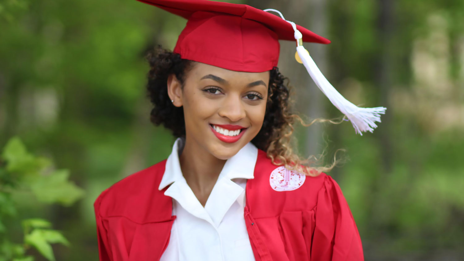 Peyton Tipton wearing her NC State undergraduate regalia