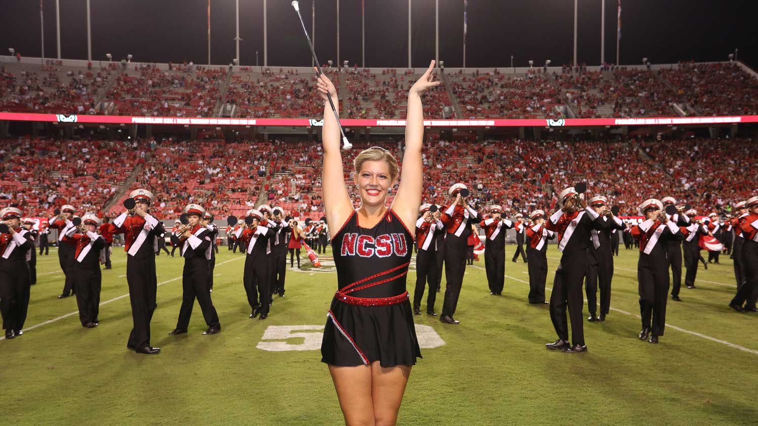 NC State twirler Claudia Swauger during a football game halftime performance
