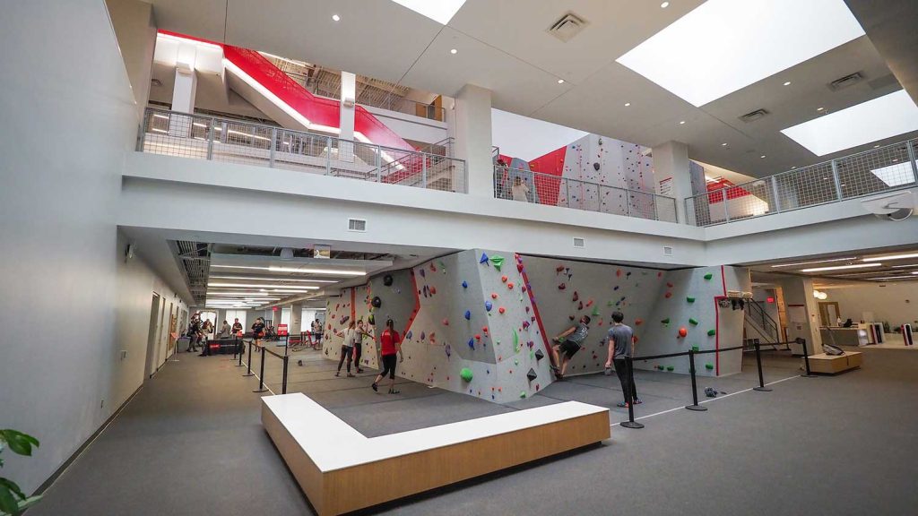 Students participate in rock climbing at the newly renovated climbing wall in Carmichael Gymnasium. 