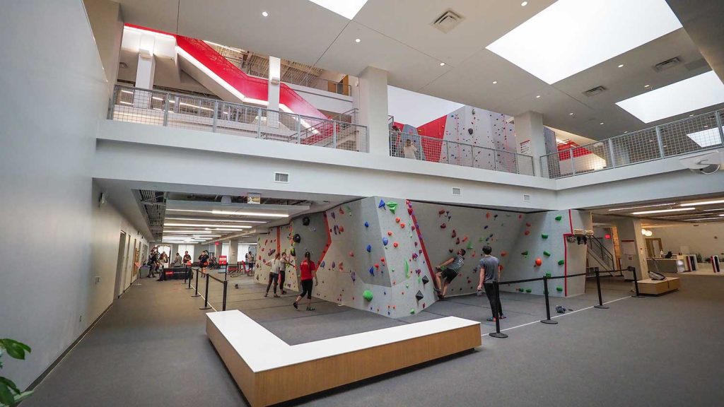 Students participate in rock climbing on the newly renovated climbing wall at Carmichael Gymnasium. 