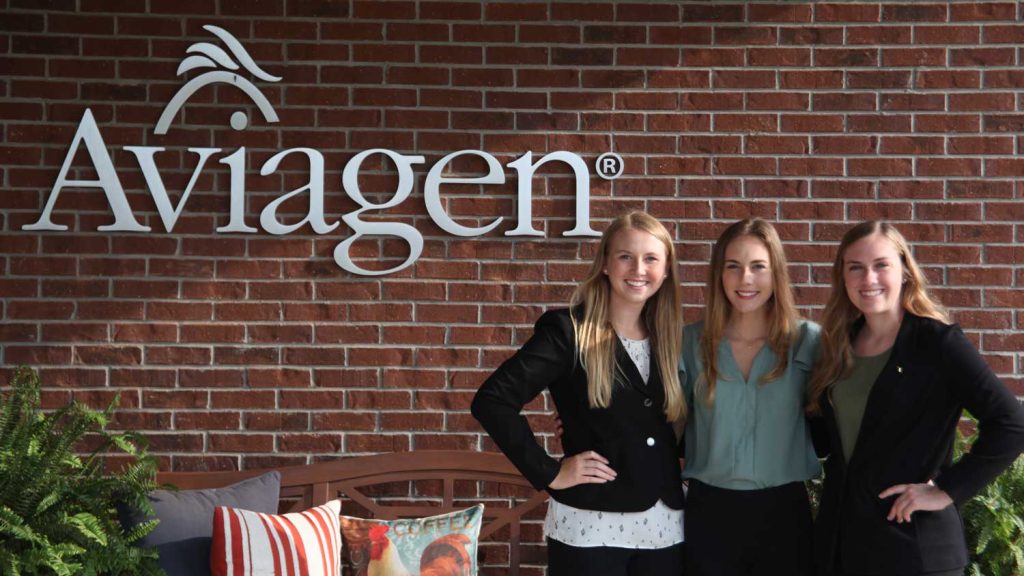 Sophie Chance (left) tkaes a picture at her internship Aviagen.