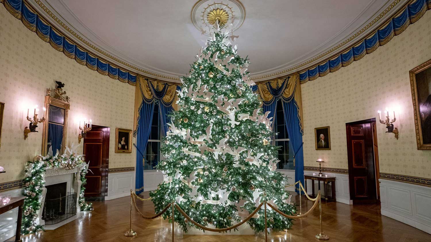 The official 2021 White House Christmas tree on display in the the Blue Room