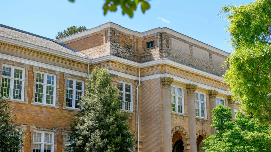 a brick building on a spring day