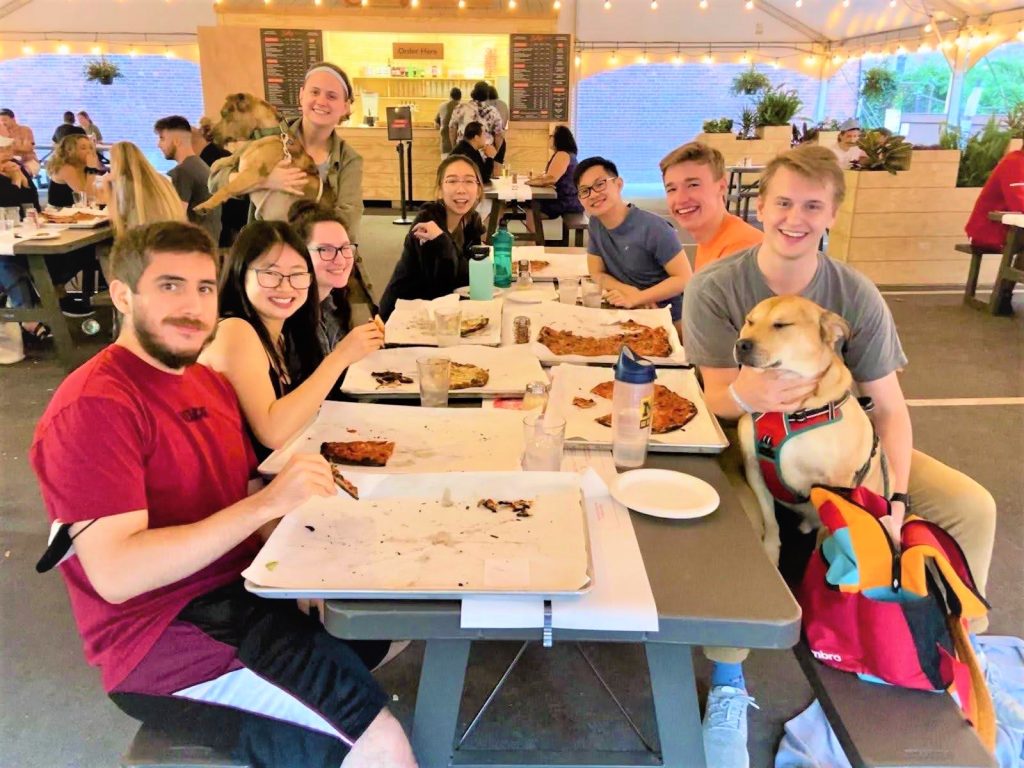 Morgan enjoys a meal with her fellow interns.