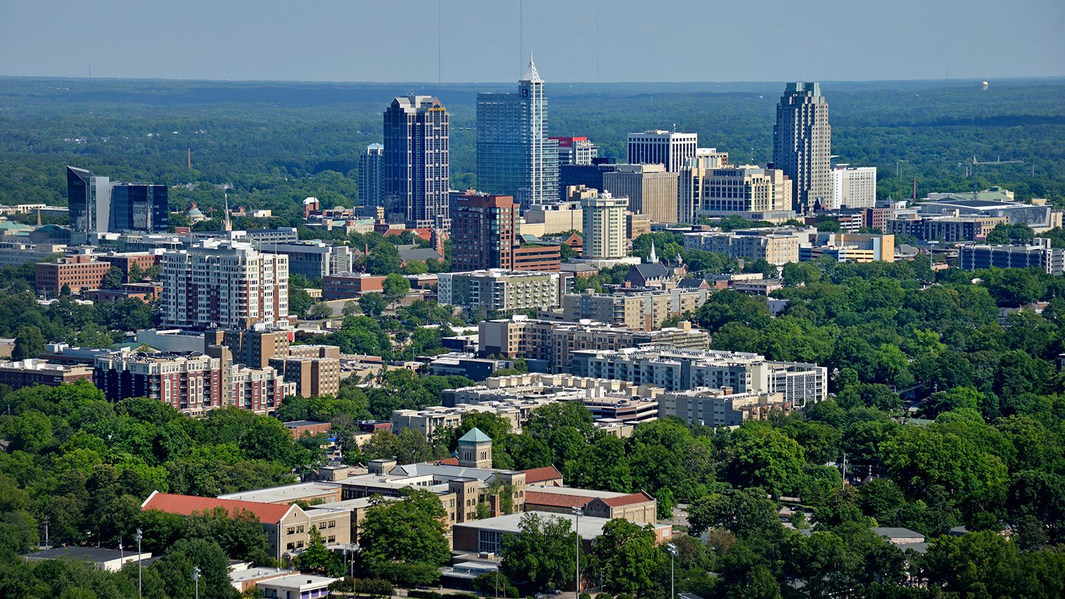 an aerial view of skyline in downtown raleigh