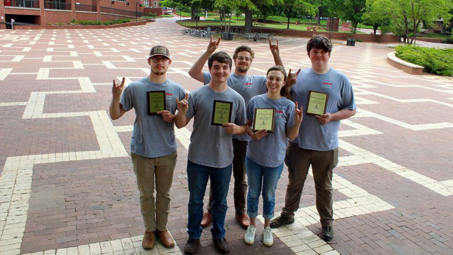 NC State students with winning plaques