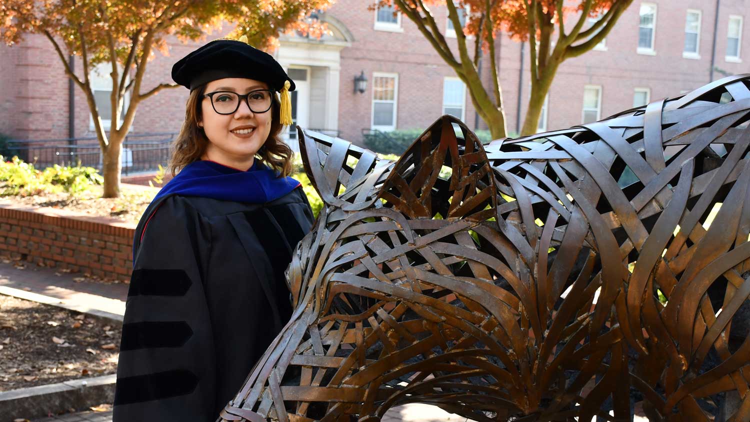 Andrea Rubio in her graduation regalia