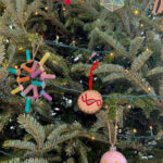 Science ornaments on a holiday tree.