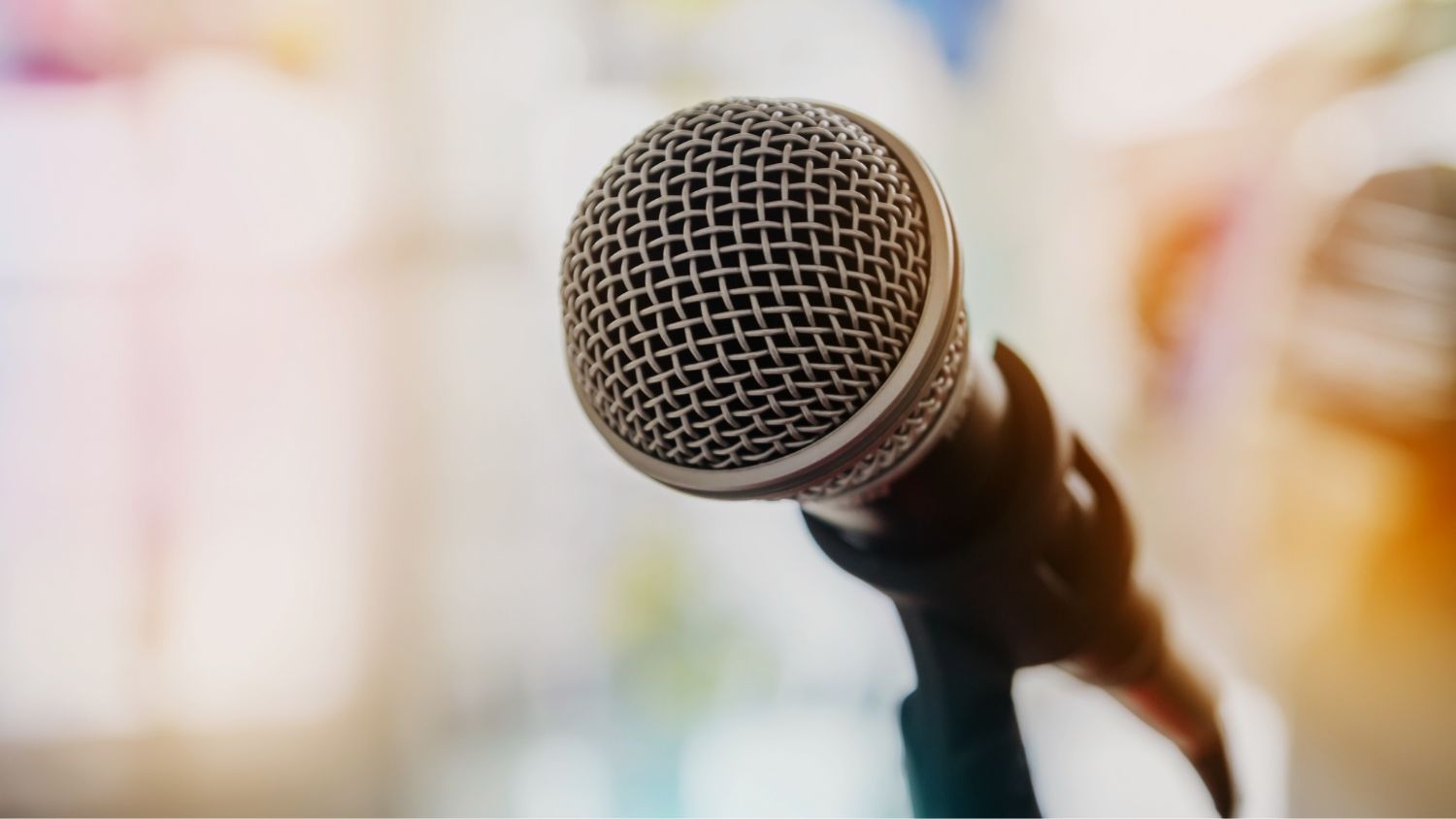 a microphone with a blurred background