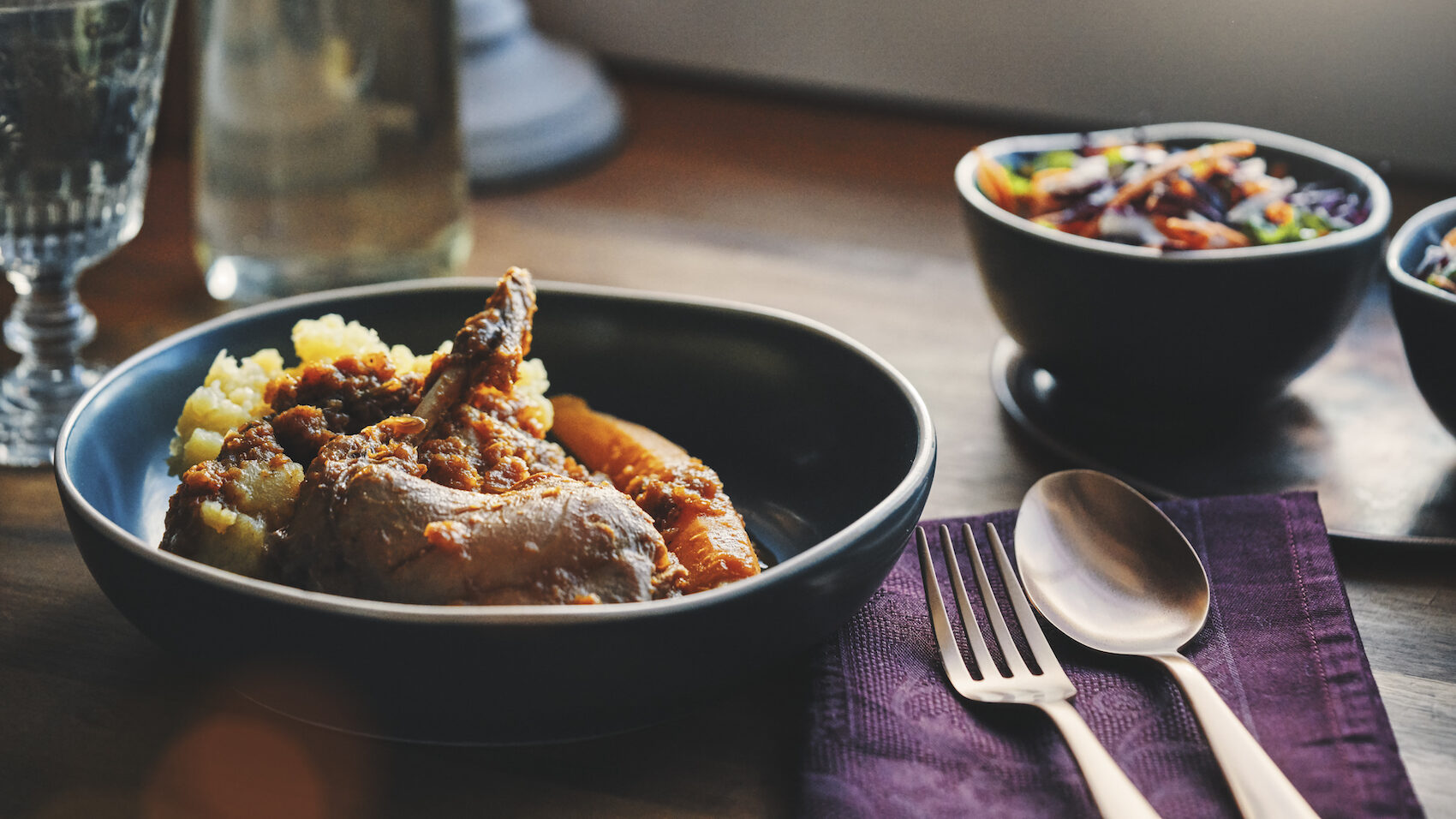 table setting for Thanksgiving featuring rabbit stew