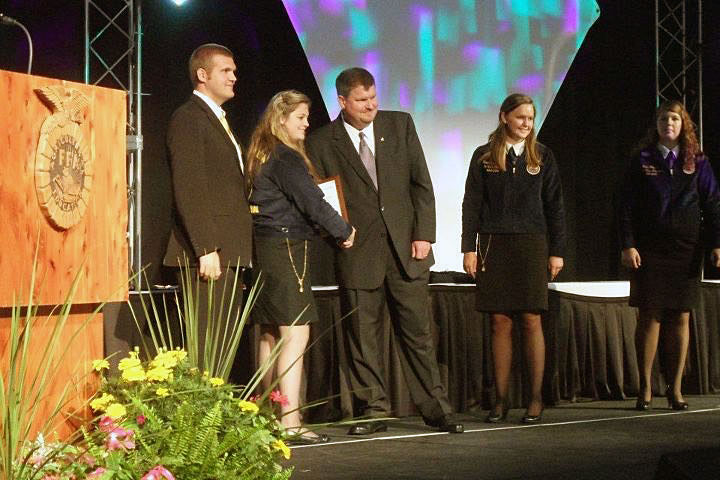 Man accepting award