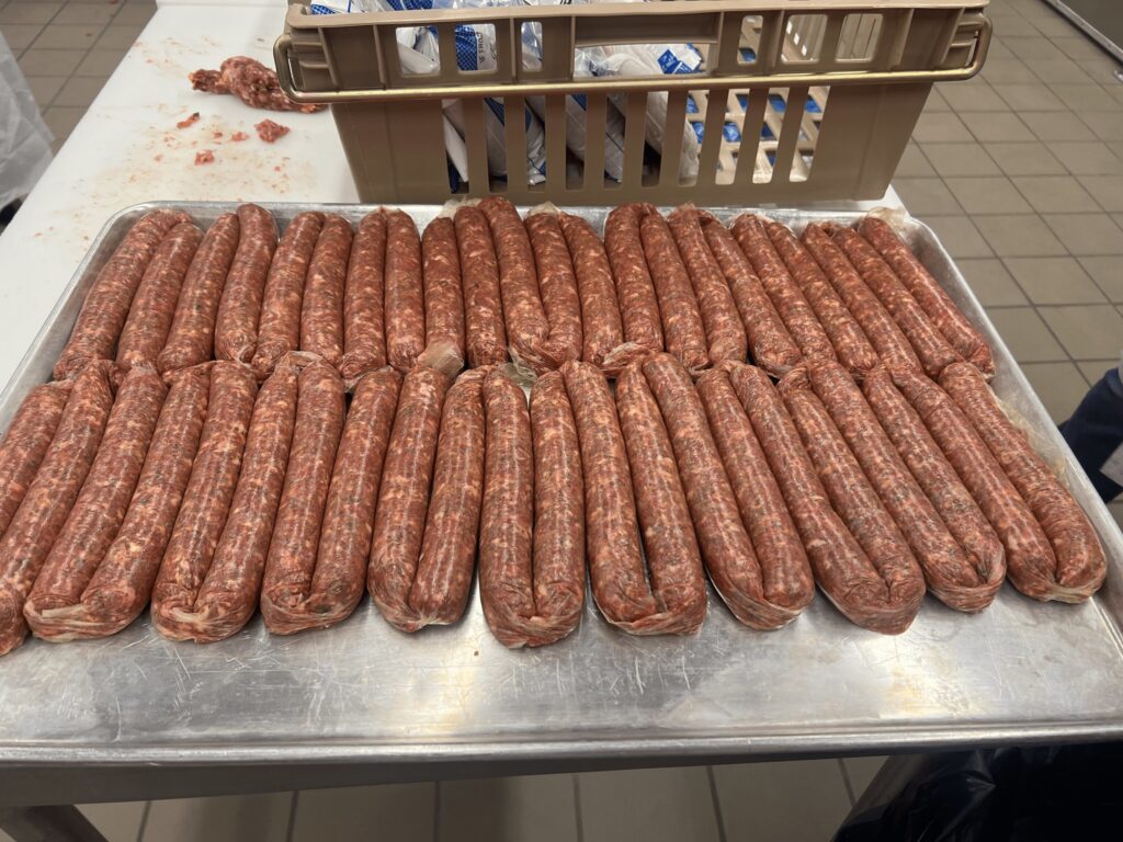 sausage links on a metal tray