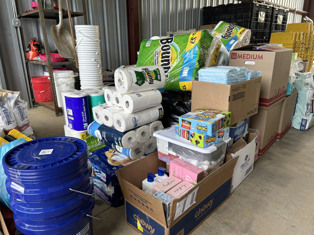 paper towels, crayons, diapers and more supplies in a warehouse