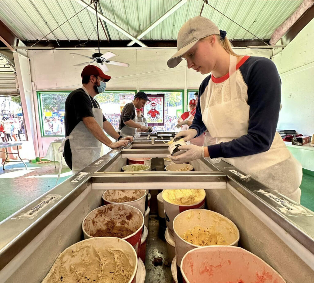 people scooping ice cream