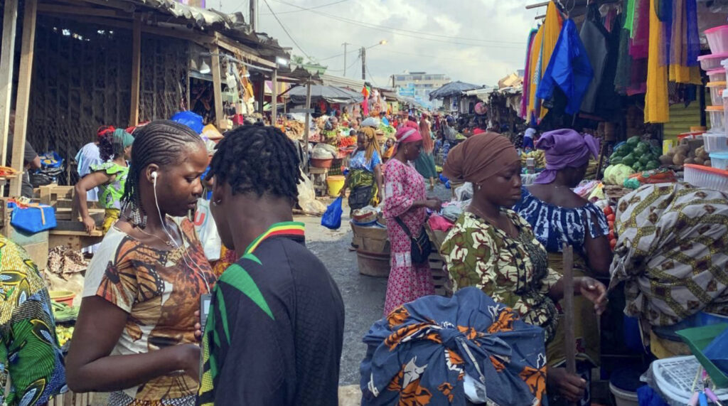 a busy outdoor market in Ivory Coast