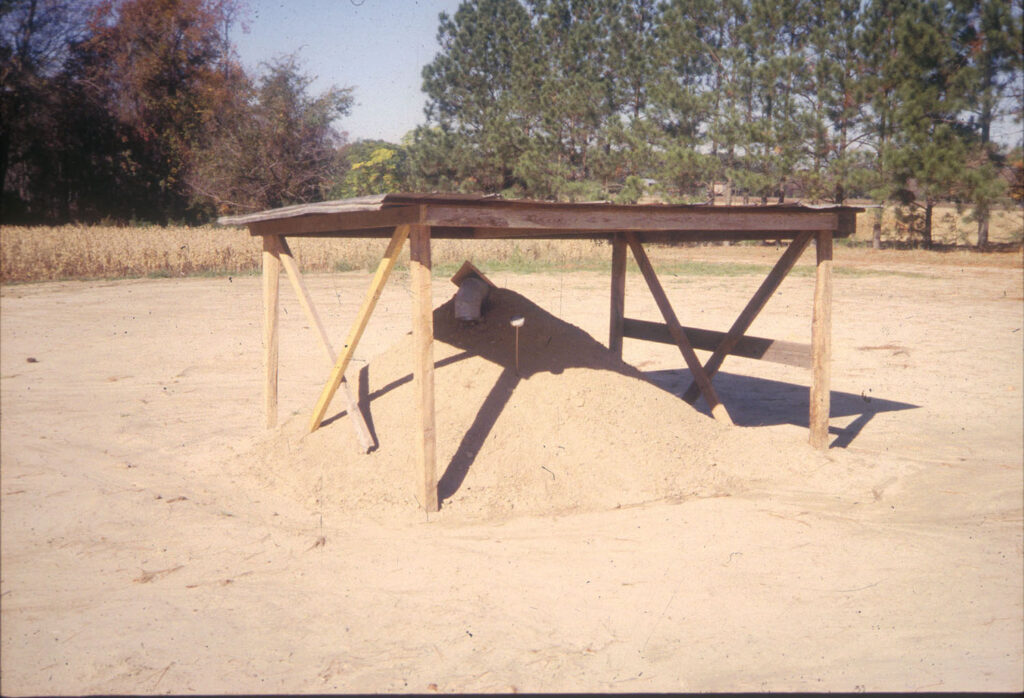 a dirt mount with a table over it