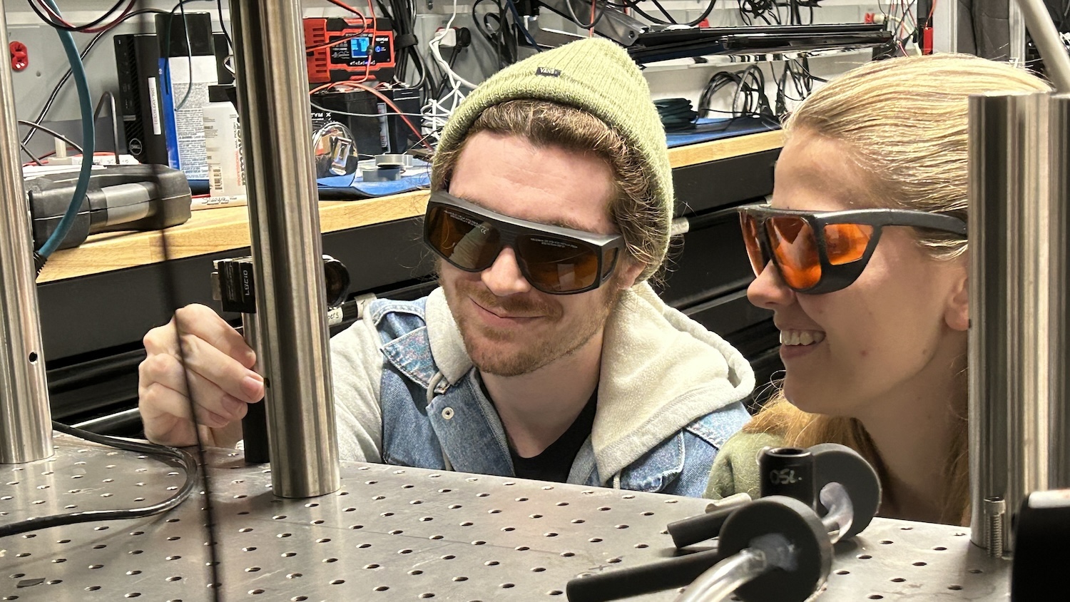 Two people in a lab with electronic devices