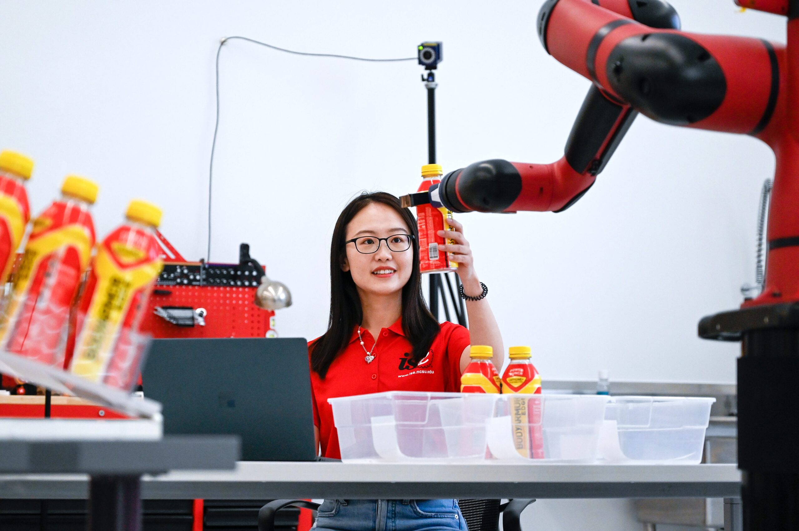 woman operating robot