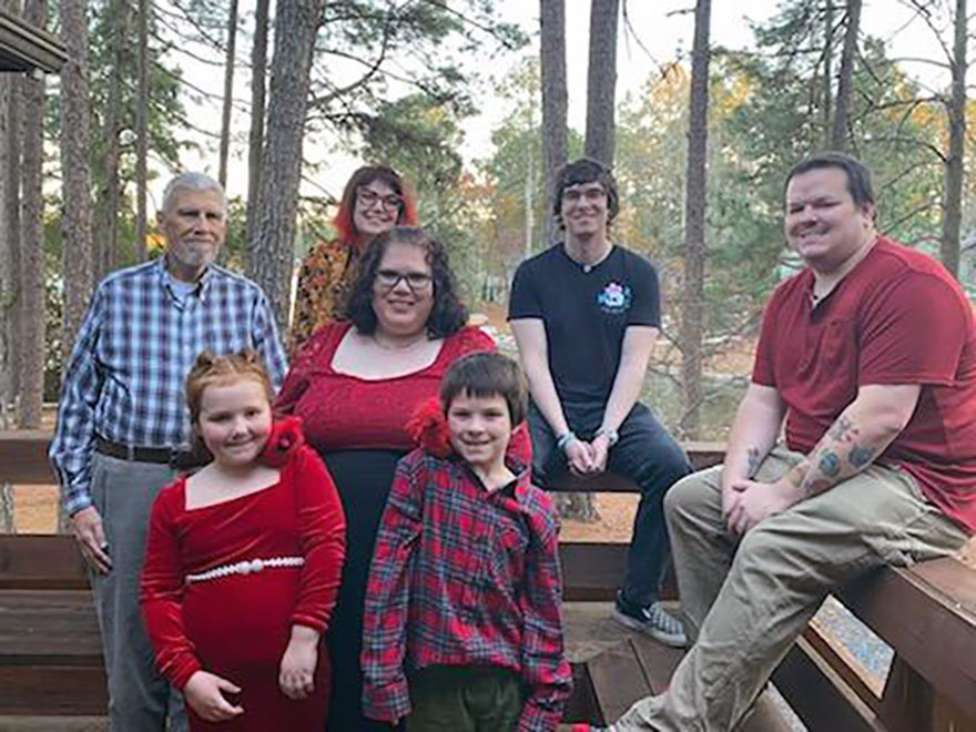 a group of people sitting outside