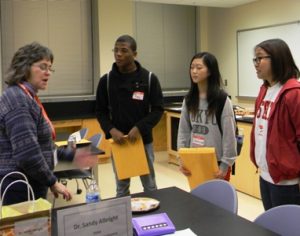 Dr. Sandy Albright (left) of Raleigh's Crossroads Veterinary Hospital talks to students