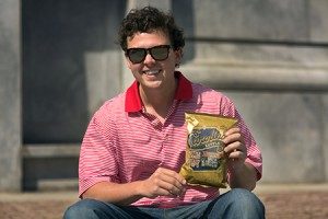 Josh with a bag of his chips