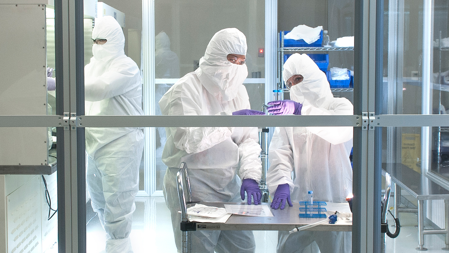 Researchers work in clean room