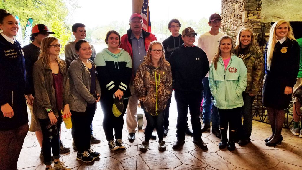 Jackie and her students meet with North Carolina Agriculture Commissioner Steve Troxler during a field trip to the N.C. State Fair.