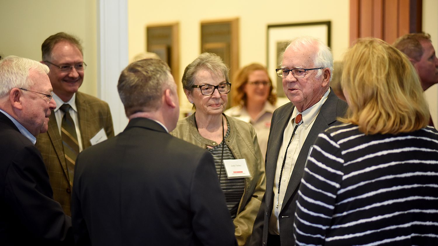 Windell (right) and Judy Talley greet Dean Richard Linton and other CALS faculty and administration before the start of the turkey unit dedication.