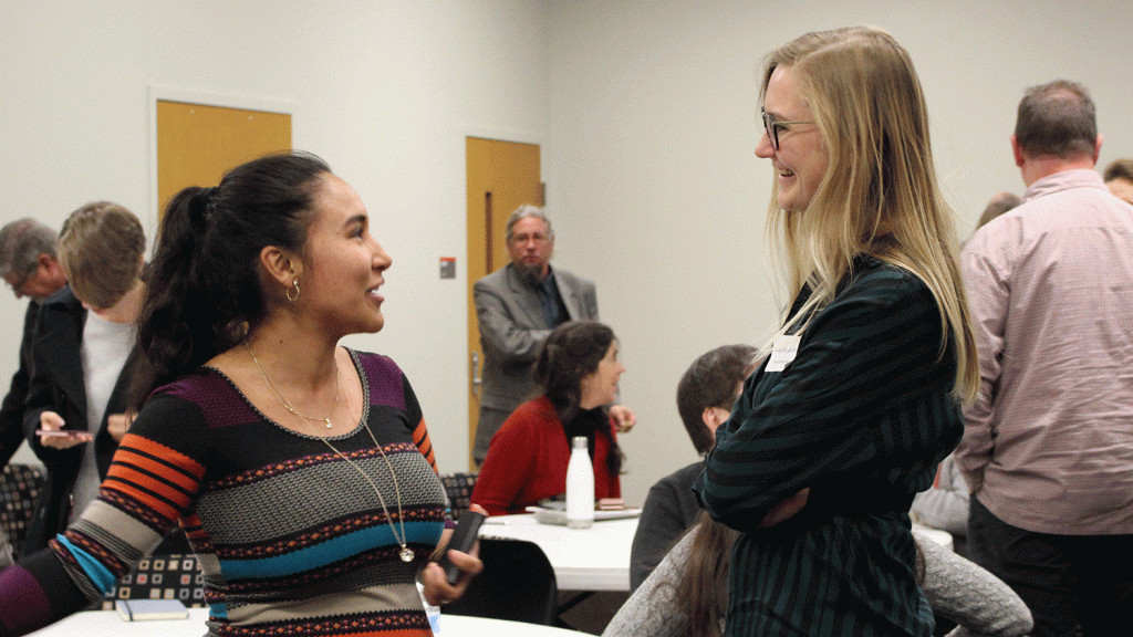 Daniela Jones and Lisa Van den Broeck talk during the ideation session.