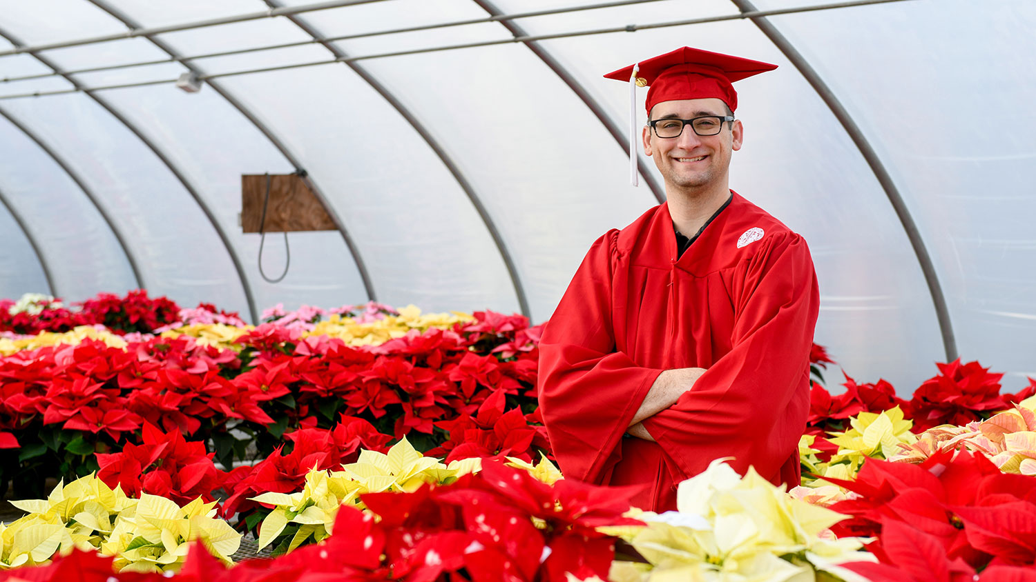 Man in cap and gown in