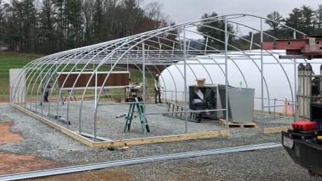The new greenhouse at Mountain Horticultural Crops Research and Extension Center while being constructed. Just a metal frame.