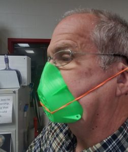 A man wearing a 3D printed mask